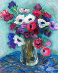 Artivare Fine Art Print of colorful bouquet of anemones in a clear vase on a textured surface with a light blue background
